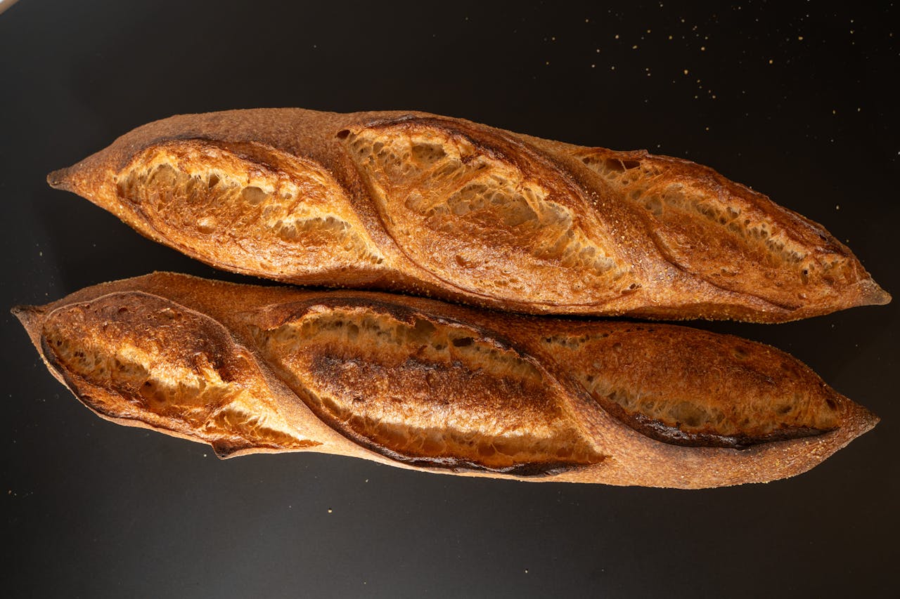 Freshly baked artisan baguettes with a crispy crust in Berlin, Germany.
